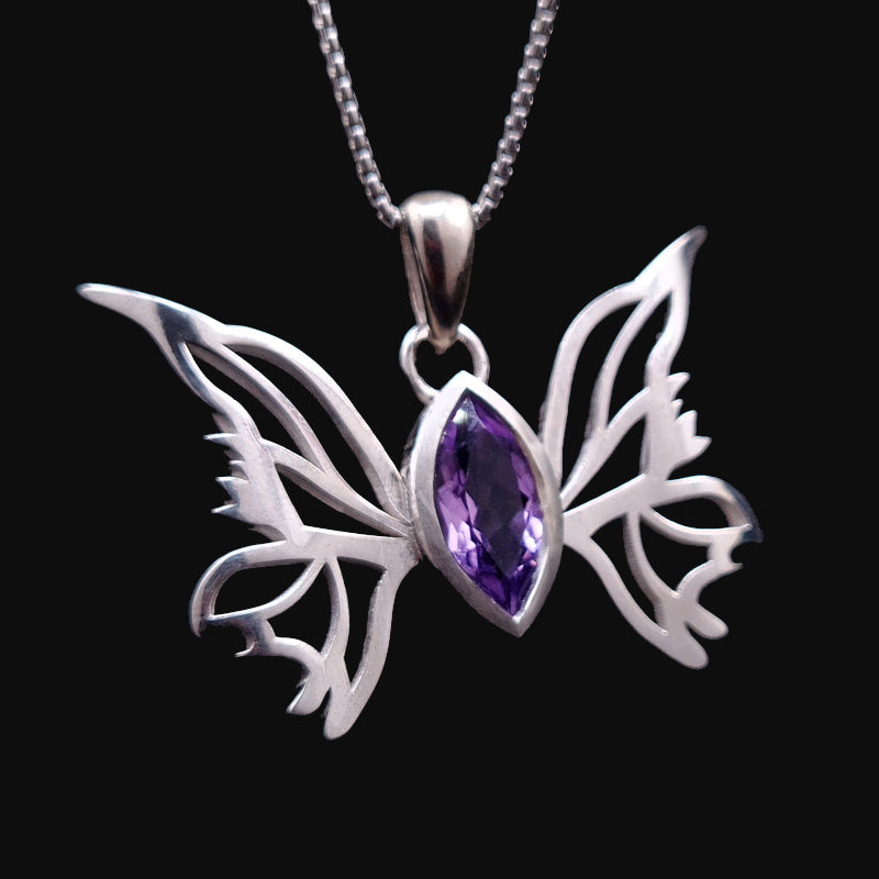 Custom-made magical butterfly pendant, shaped like fairy wings, set with a marquise Amethyst gemstone, made from Sterling silver, by RBZ Jewelry.