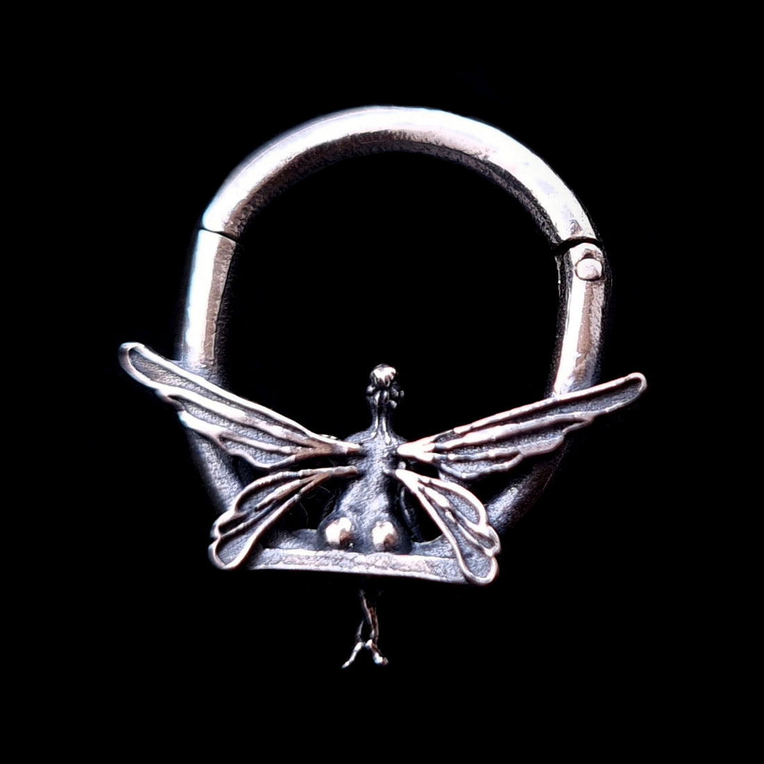 Back view of 925 sterling silver fairy clicker septum ring showing the detailed back of the fairy's body and wing textures
