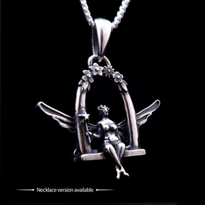 Solid 925 sterling silver fairy pendant featuring a detailed fairy sitting on a swing under a floral arch, shown on a silver chain as the necklace version of the design, by RBZ Jewelry.