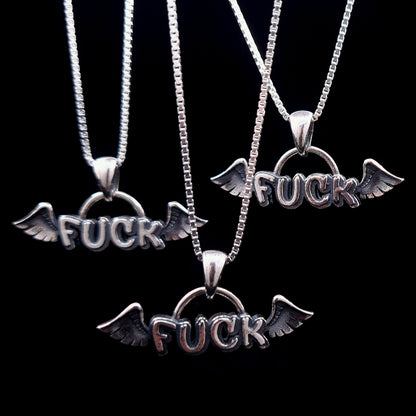 Three sterling silver Flying Fuck pendants by RBZ Jewelry, arranged in a group to resemble a flock of winged "FUCK" charms on silver chains against a black background.