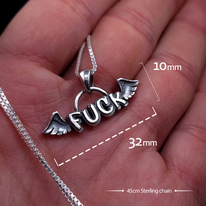 Sterling silver Flying Fuck pendant by RBZ Jewelry held in an open hand to show scale, with graphic overlays indicating dimensions of 32mm wide by 10mm high and a 45cm sterling silver chain.
