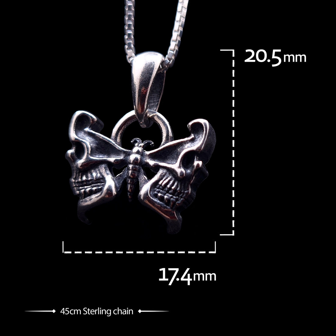 Frontal view of the RBZ Jewelry Sterling silver Gothic Butterfly Skull pendant showing dimensions of 20.5mm height and 17.4mm width, including a 45cm Sterling silver chain on a black background.
