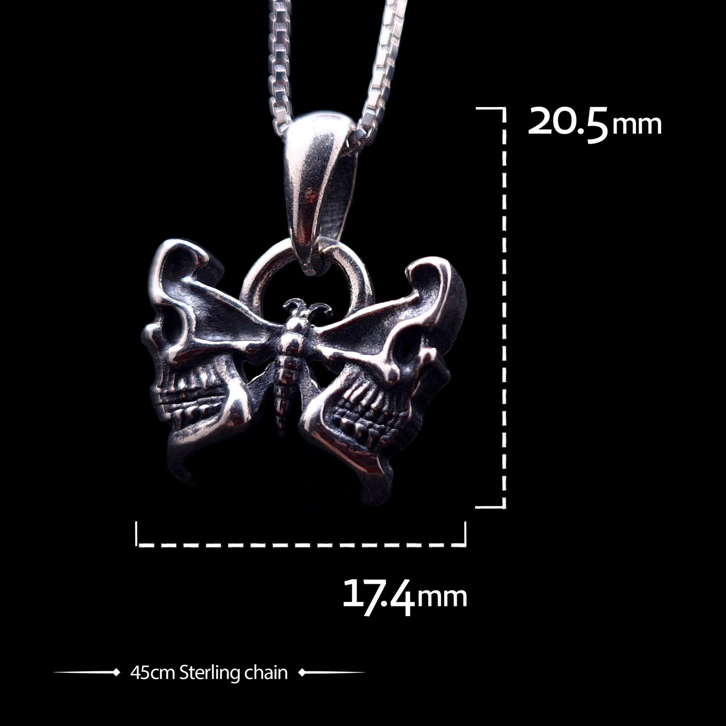Frontal view of the RBZ Jewelry Sterling silver Gothic Butterfly Skull pendant showing dimensions of 20.5mm height and 17.4mm width, including a 45cm Sterling silver chain on a black background.
