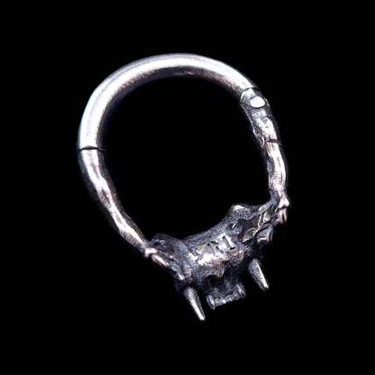 Back view of the RBZ Jewelry sterling silver Cat Skull septum ring, detailing the textured anatomical skull texture, fangs, clicker hinge mechanism, and the 'RBZ' logo engraving from behind, on a black background.