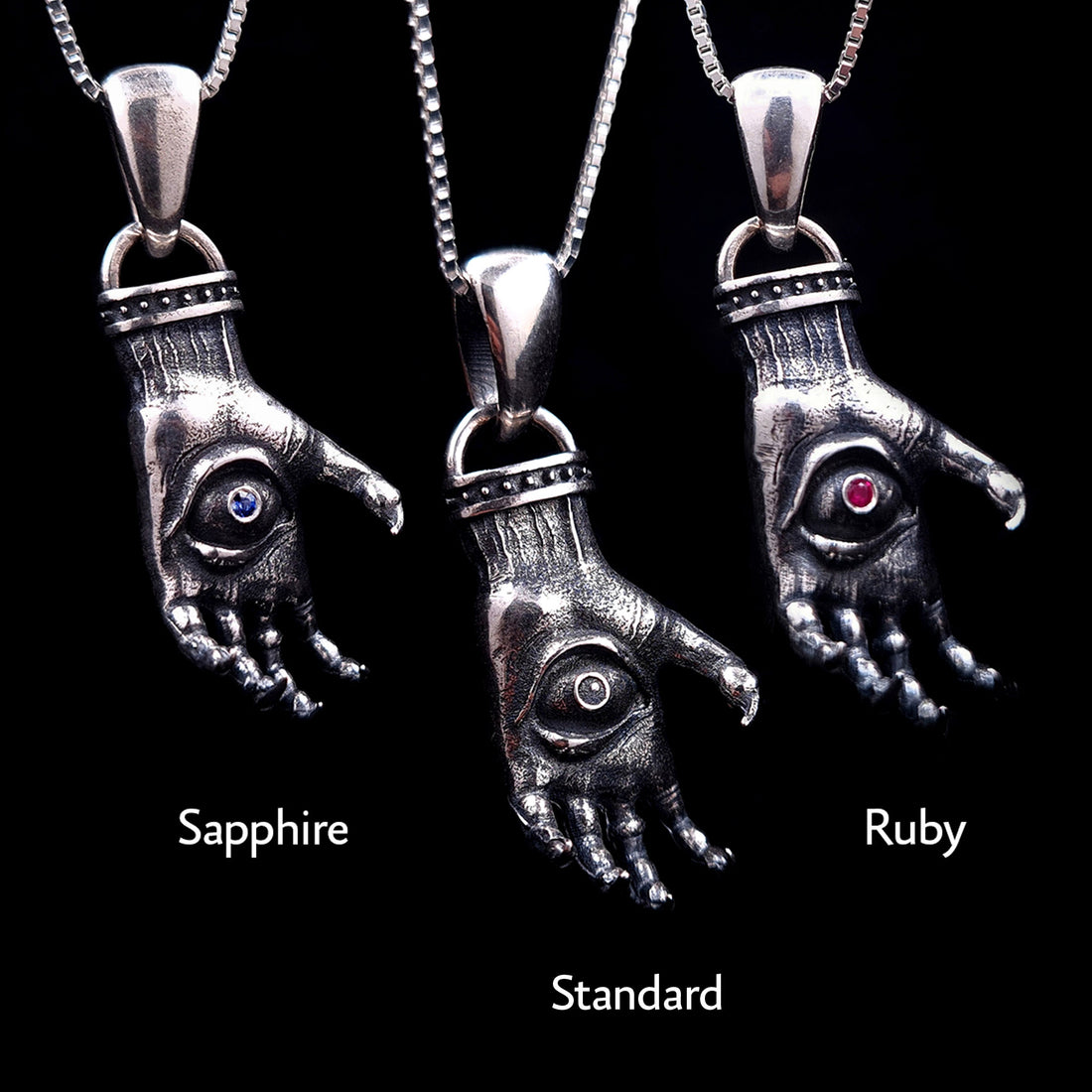 'The Nocturnal Hamsa' Sterling Silver Pendant Variations by RBZ Jewelry - Comparison view of three Gothic clawed hand designs featuring Sapphire, Standard (no stone), and Ruby gemstone options.