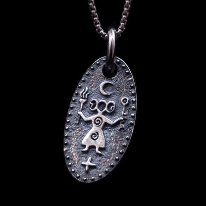 Front view of the Hecate, Greek triple goddess medallion in solid 925 sterling silver by RBZ Jewelry, featuring an oxidized ancient cave art style with torches, key, and crescent moon symbols