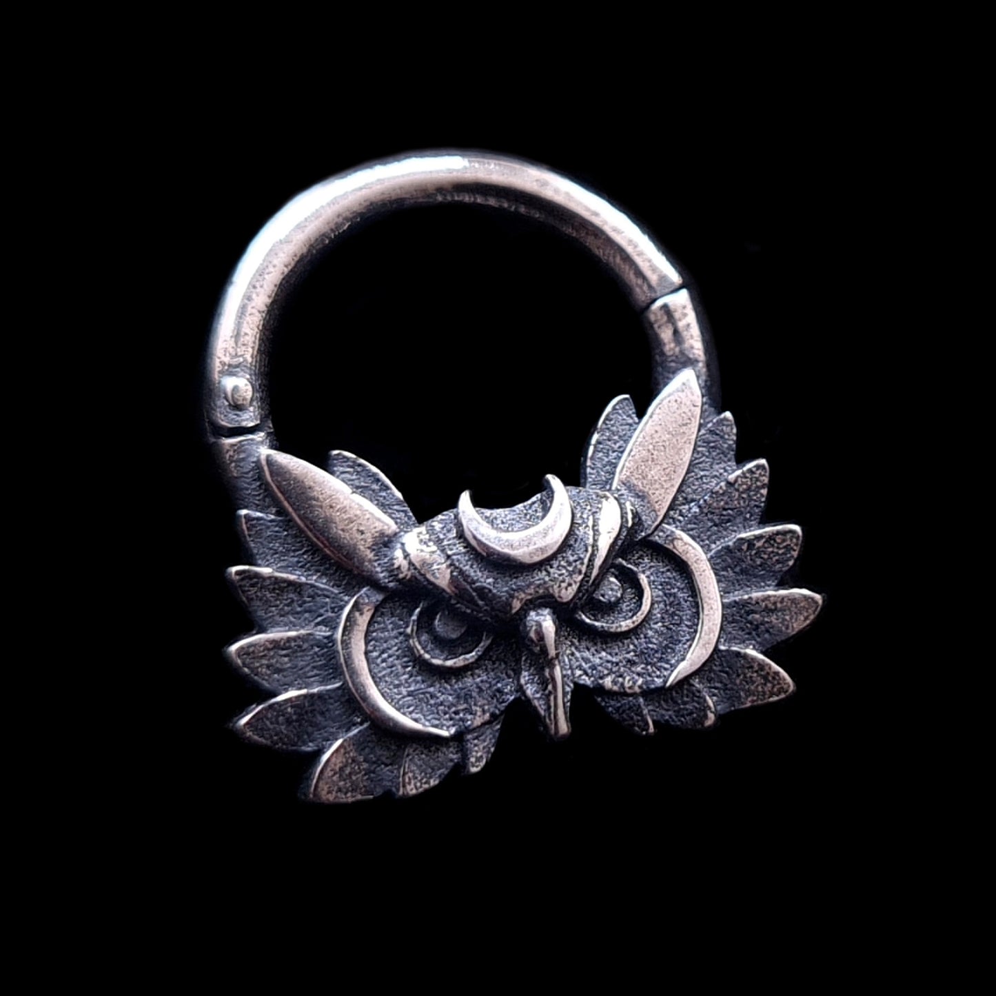 Sterling silver Moon Owl septum ring by RBZ Jewelry, featuring a handcrafted, detailed owl face with a silver crescent moon on the forehead and textured wings. The gothic-style septum clicker has a weathered, dark oxidized finish and is centered against a solid black background.