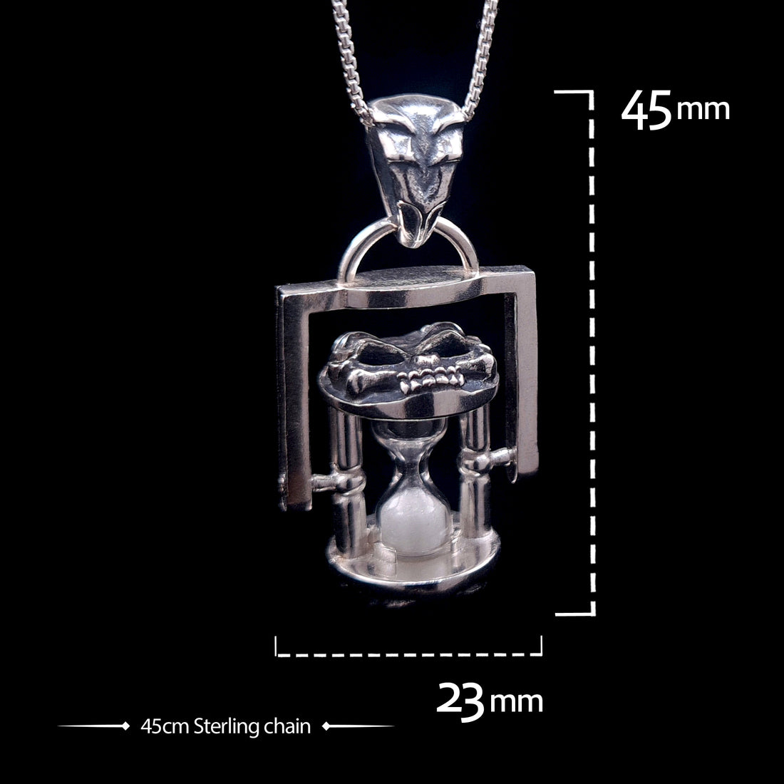 Technical size chart for the Rotating Skull Hourglass Pendant, showing dimensions of 45mm height by 23mm width and a 45cm sterling silver chain.