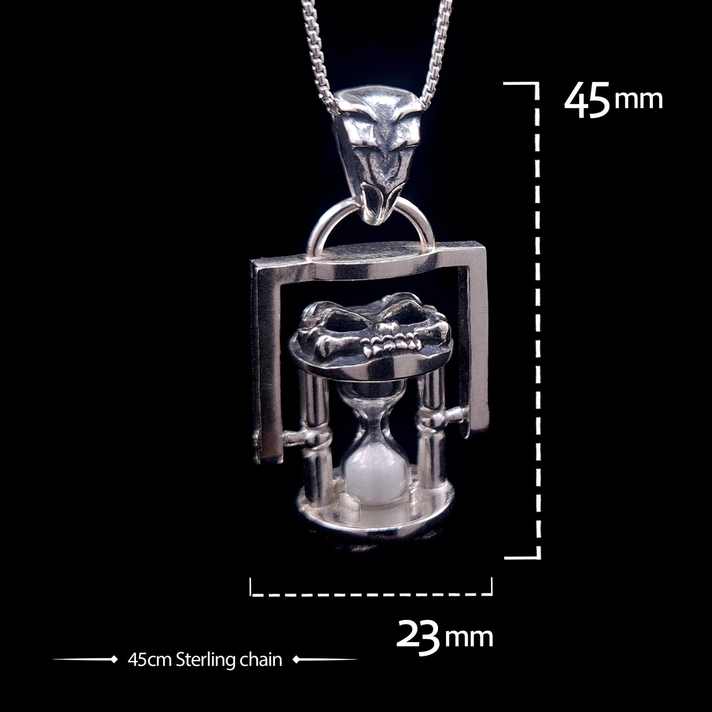 Technical size chart for the Rotating Skull Hourglass Pendant, showing dimensions of 45mm height by 23mm width and a 45cm sterling silver chain.