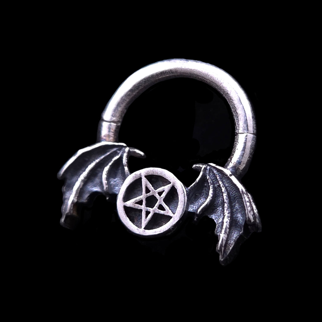 Gothic 925 sterling silver septum clicker ring by RBZ Jewelry, featuring an intricately detailed pentagram flanked by oxidized demon bat wings.
