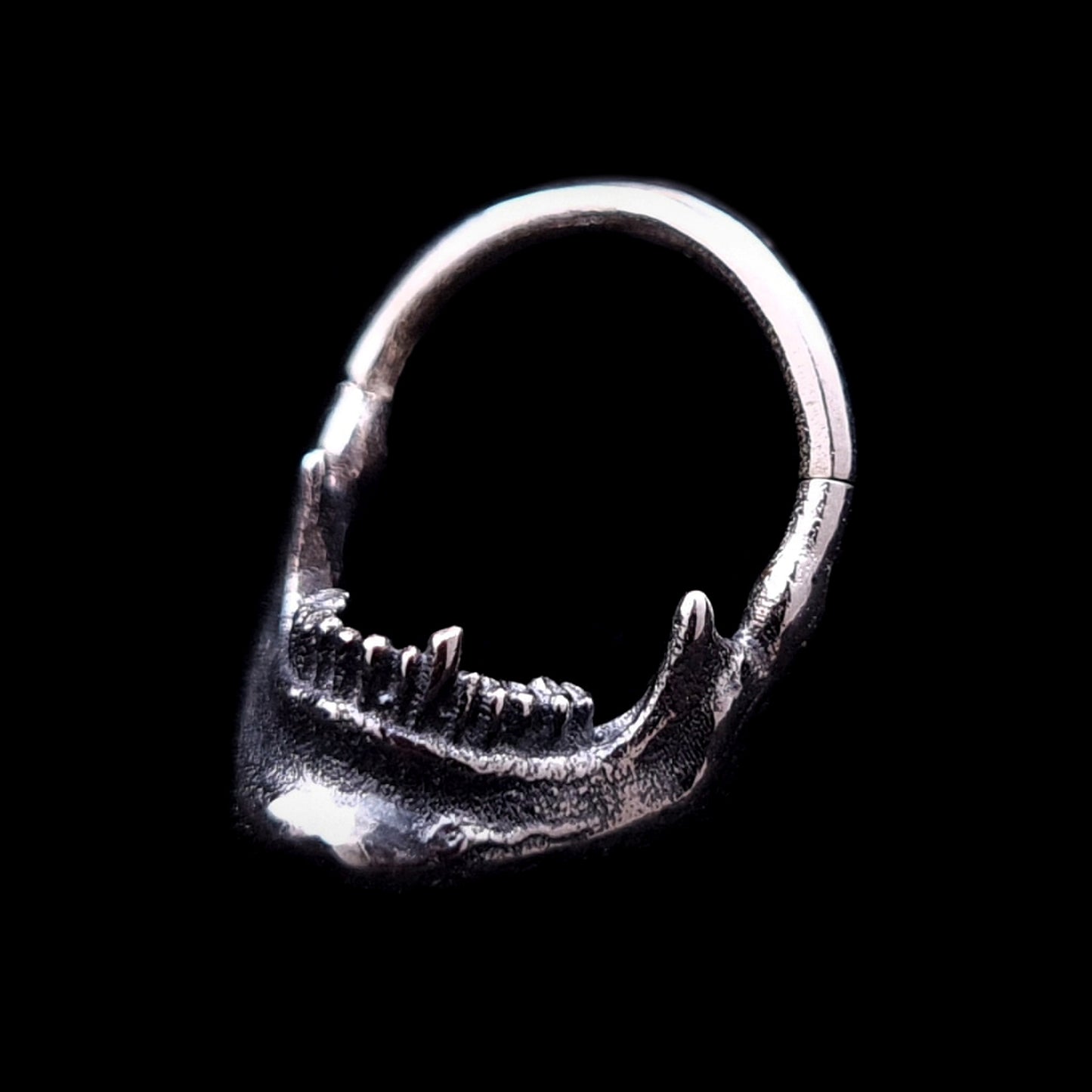 Sterling silver Reaped Mandible septum ring by RBZ Jewelry featuring a detailed anatomical skull jaw design with visible teeth, an oxidized gothic finish, and a hinged clicker closure.