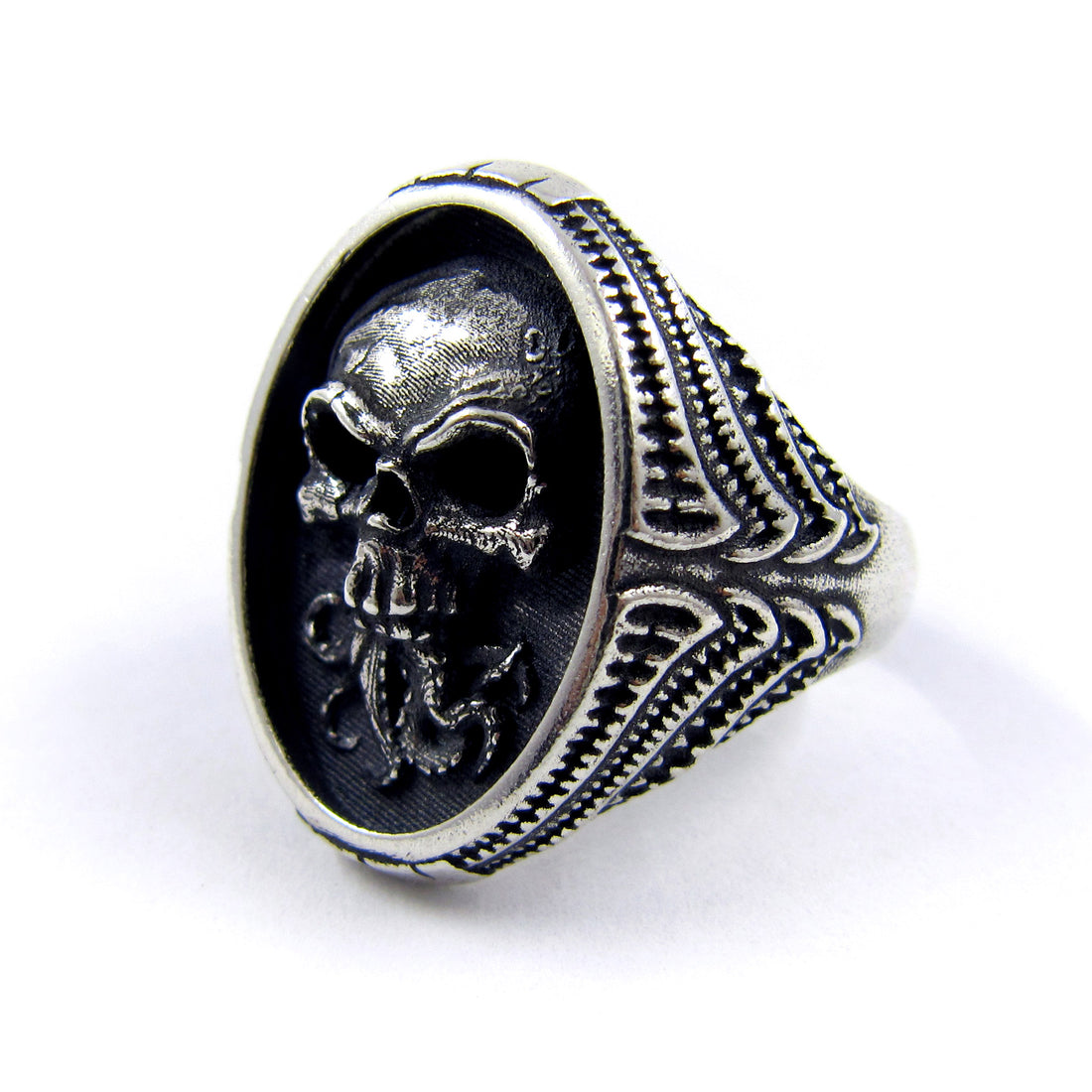 RBZ Jewelry Sterling Silver Tentacle Skull Signet Ring on a white background, showcasing the side profile with high-relief skull detailing and intricate bio-organic textured carvings on the band.