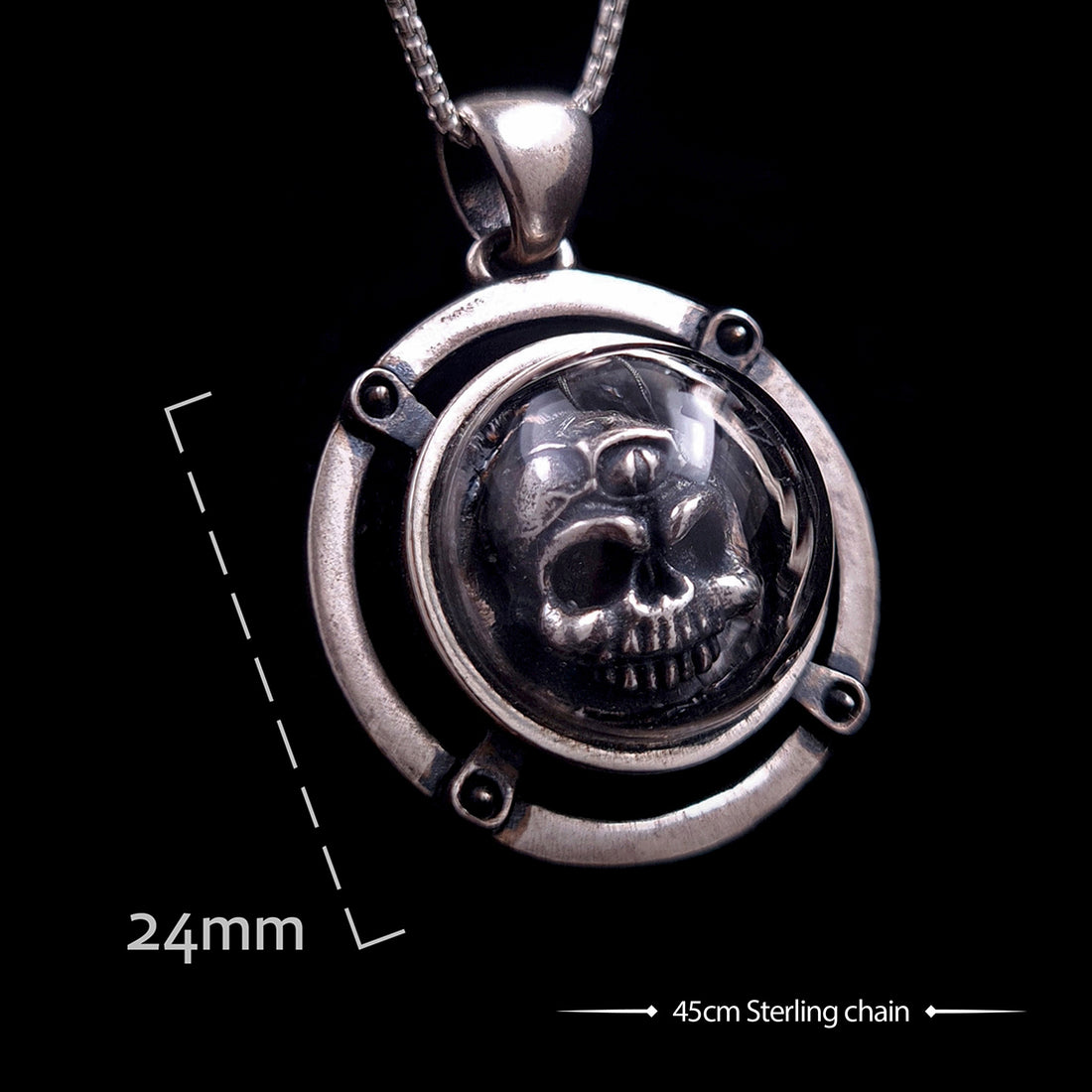 Dimensions and specifications for the RBZ Jewelry sterling silver Third-eye Skull pendant, indicating a 24mm diameter for the glass-domed skull housing and an accompanying 45cm sterling silver chain.