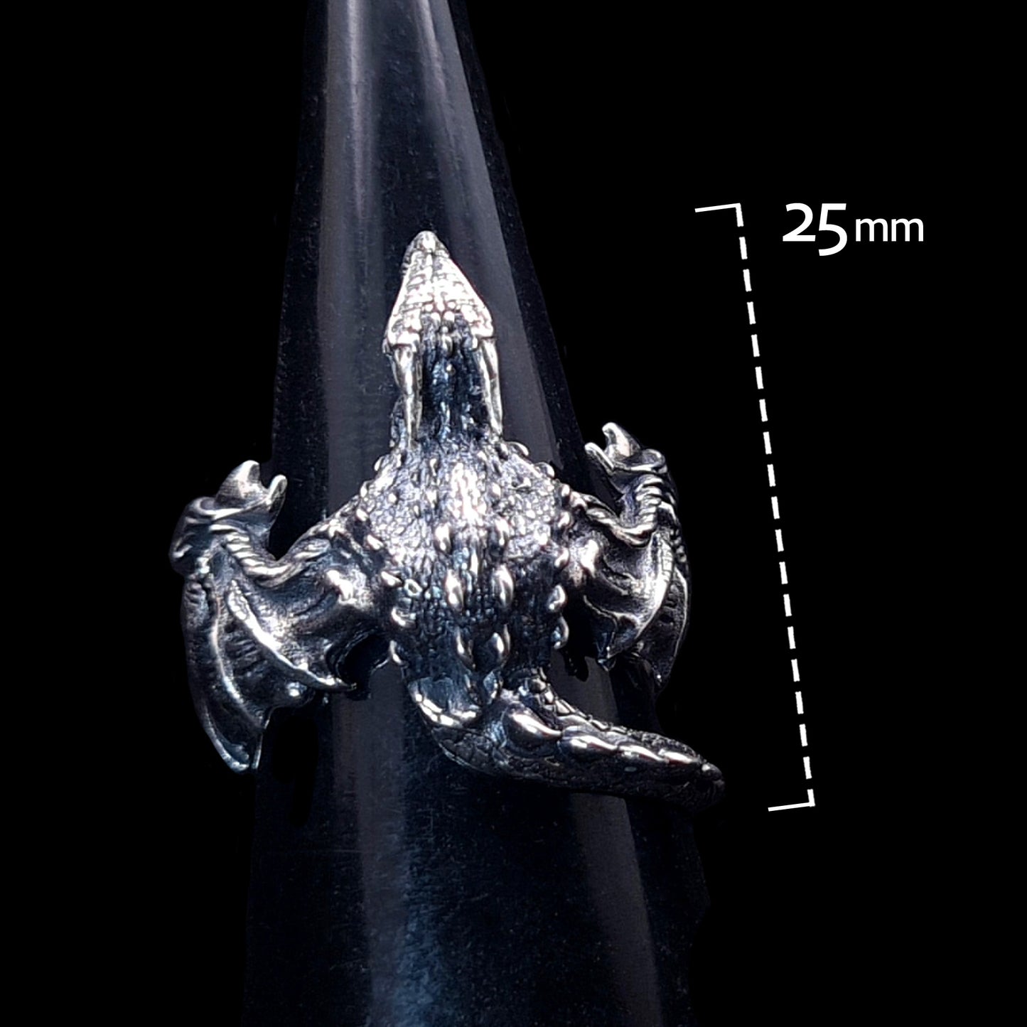 Gothic sterling silver dragon ring by RBZ Jewelry on a black mandrel, showing a top-down view of the spread wings, scaled body, and a 25mm height measurement graphic.