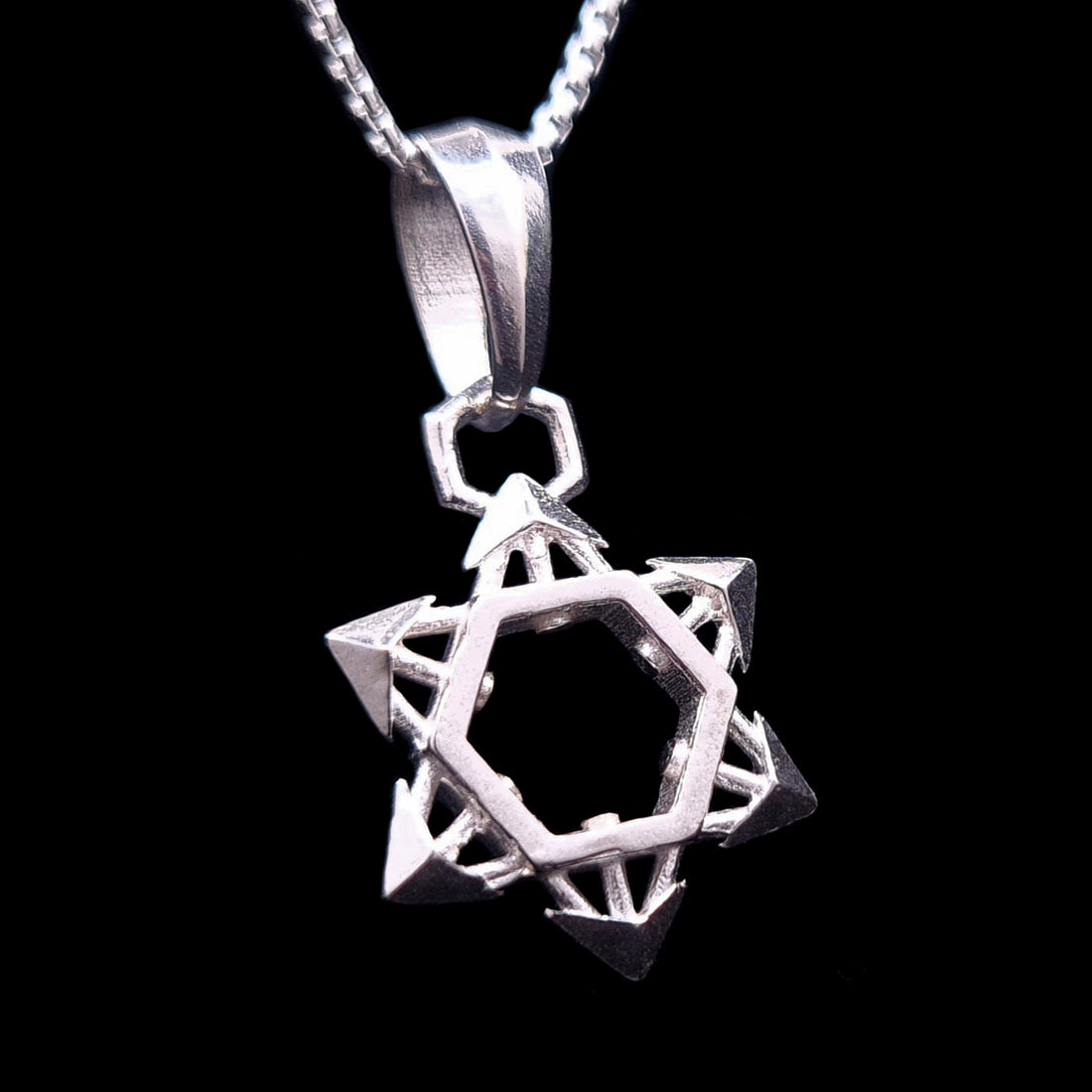 RBZ Jewelry Sterling Silver Industrial Star of David Pendant featuring a shuriken-inspired 3D geometric design with a hollow hexagonal center and sharp, arrow-like points.