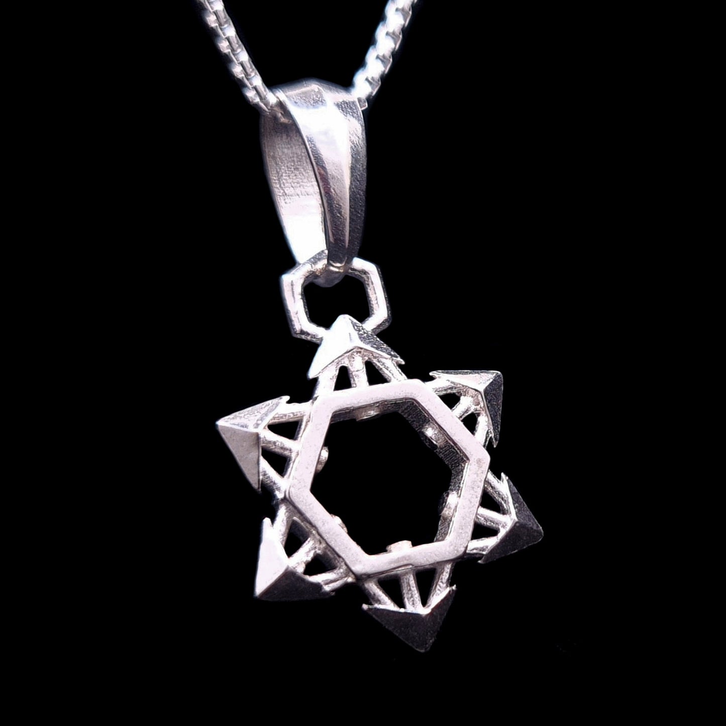 RBZ Jewelry Sterling Silver Industrial Star of David Pendant featuring a shuriken-inspired 3D geometric design with a hollow hexagonal center and sharp, arrow-like points.