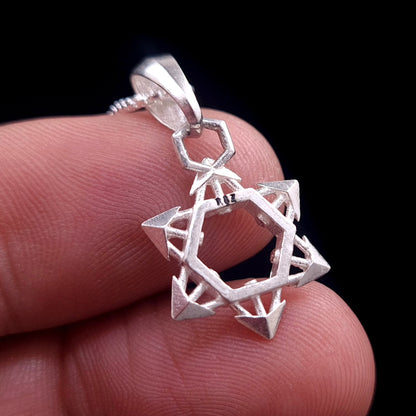 RBZ Jewelry Sterling Silver Industrial Star of David pendant back view, held in hand for scale. This close-up view shows the reinforced geometric structure and the internal 'RBZ' hallmark against a black background.