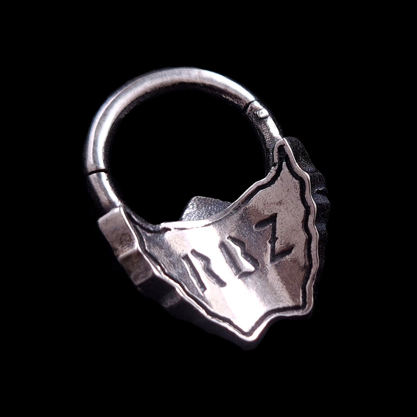 Back view of the Sterling silver Samurai Oni mask septum ring by RBZ Jewelry, showing the RBZ logo engraving and the secure clicker mechanism.