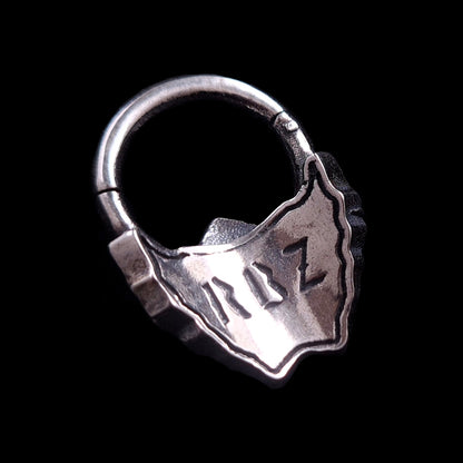 Back view of the Sterling silver Samurai Oni mask septum ring by RBZ Jewelry, showing the RBZ logo engraving and the secure clicker mechanism.