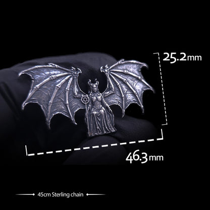 Product dimensions view of the RBZ Jewelry Gothic Sterling silver Lilith Demon Angel pendant held in a black-gloved hand. Text overlay shows precise measurements: 25.2 mm height and 46.3 mm width across the skeletal bat wings, with a label indicating a 45cm Sterling silver chain included.
