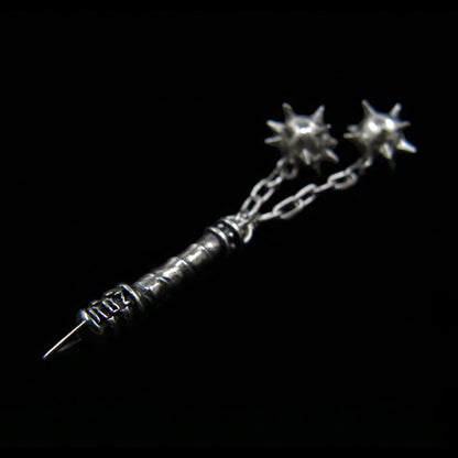 Side view of the Sterling silver Flail Crusher pendant by RBZ Jewelry, highlighting the engraved RBZ logo on the handle base and two sharp spiked spheres on chains in a gothic medieval style.