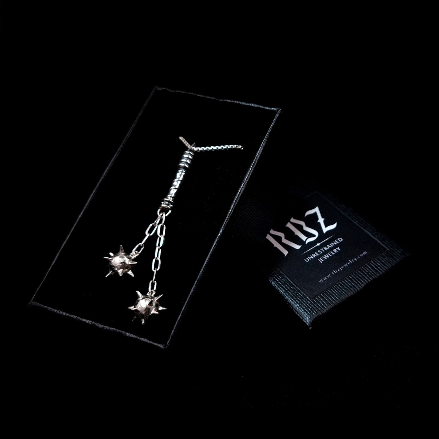 Sterling silver Flail Crusher pendant by RBZ Jewelry presented in a black branded box, highlighting the gothic medieval weapon design and handcrafted spiked morning star spheres.