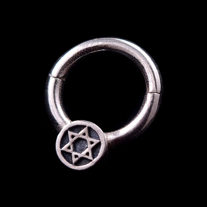 Sterling silver Star of David septum clicker ring by RBZ Jewelry, featuring a handcrafted Magen David emblem on a circular medallion.
