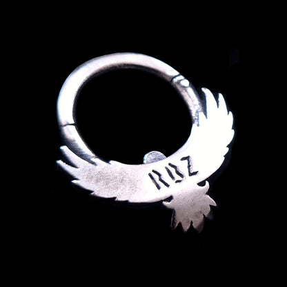 Back view of the Sterling silver Tribal Eagle septum ring by RBZ Jewelry, showcasing the RBZ logo hallmark and the clicker hinge mechanism on a black background