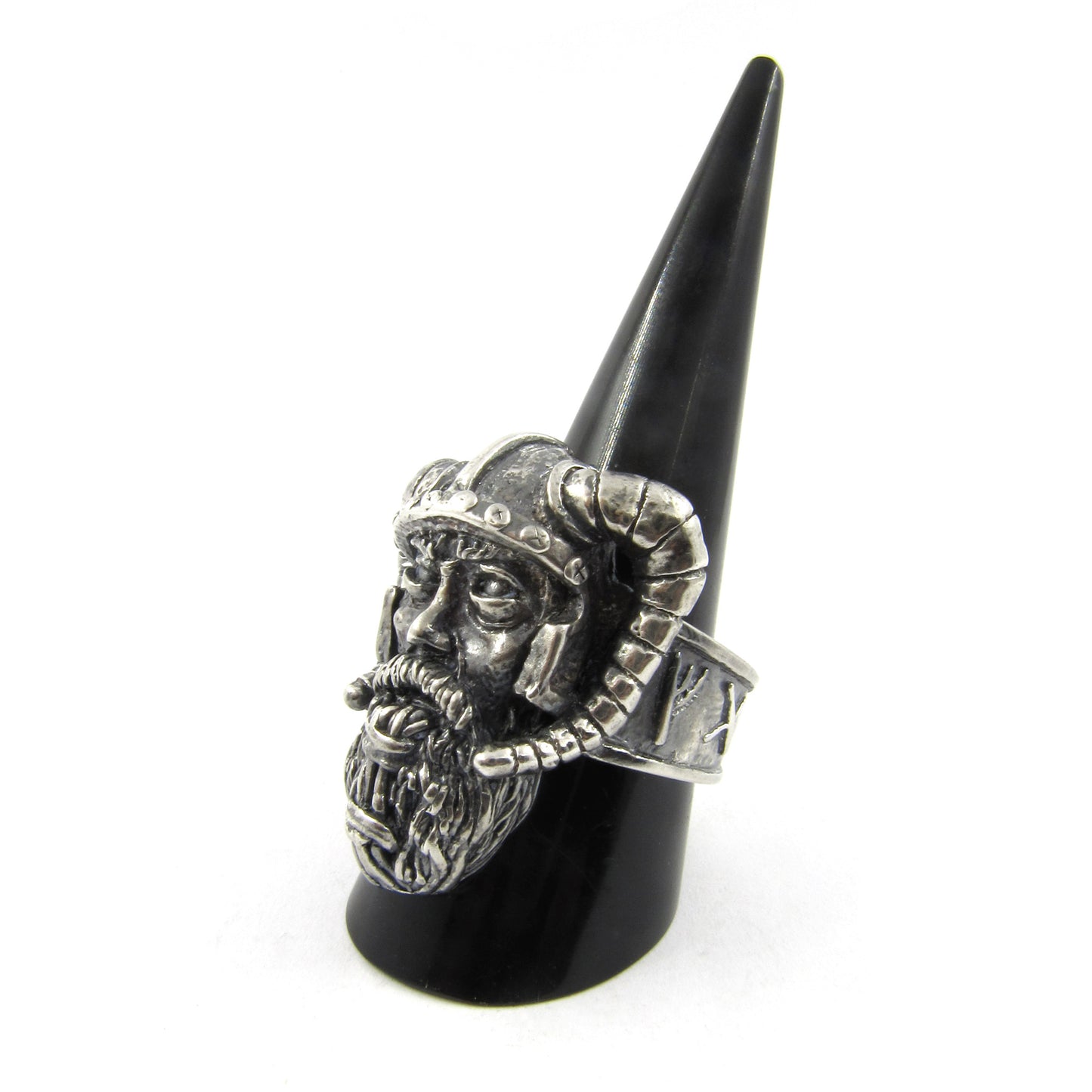 Sterling silver Viking warrior ring by RBZ Jewelry displayed on a black conical ring stand, showcasing the detailed warrior face and runic engravings against a white background.